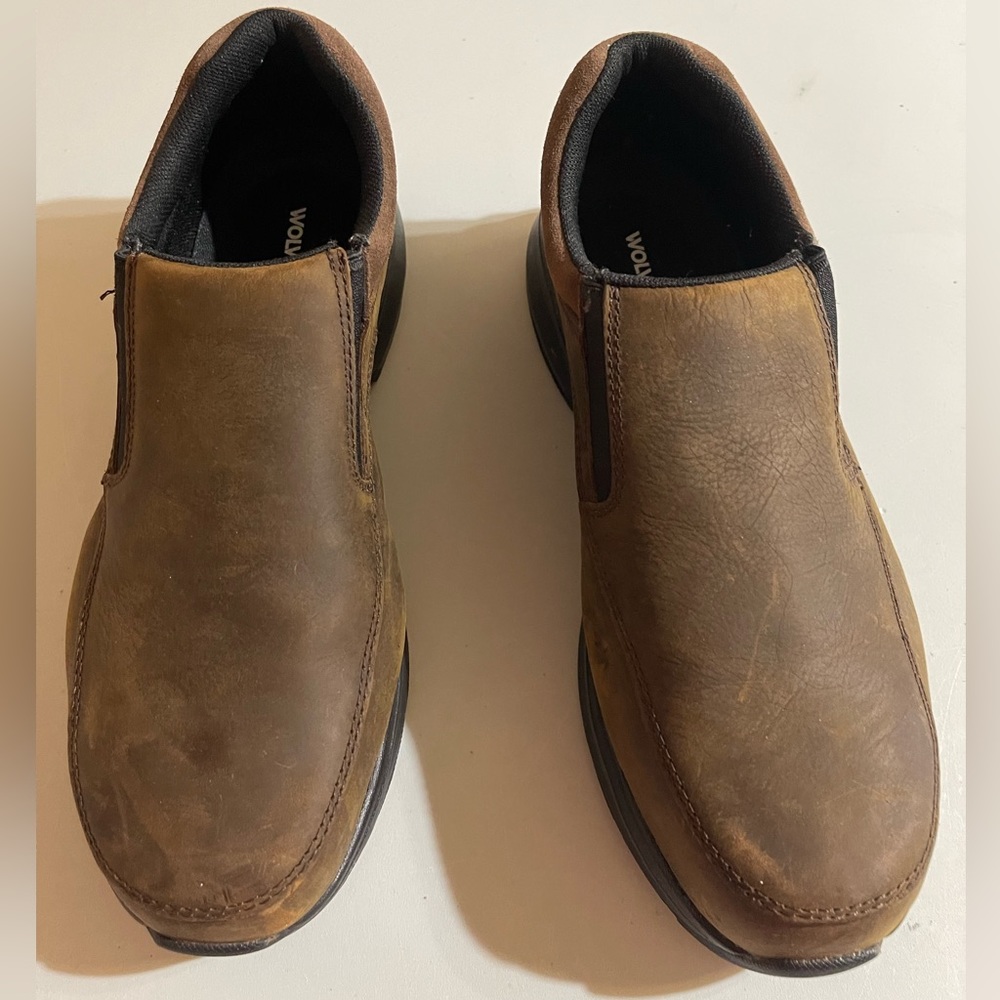 NWOT Wolverine brown slip on steel toe shoe, never worn, 12EW.